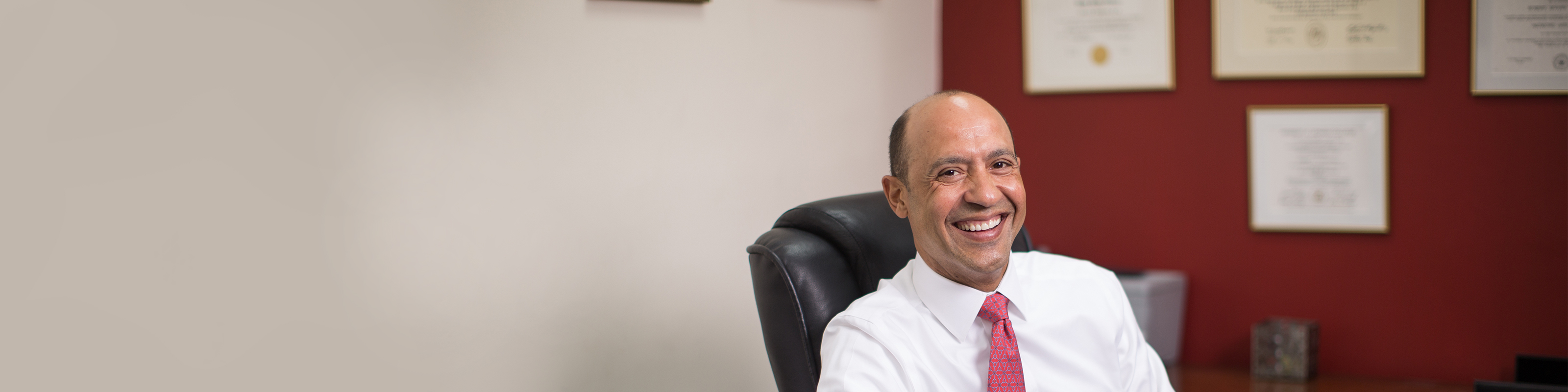 Dr. Valenzuela smiling