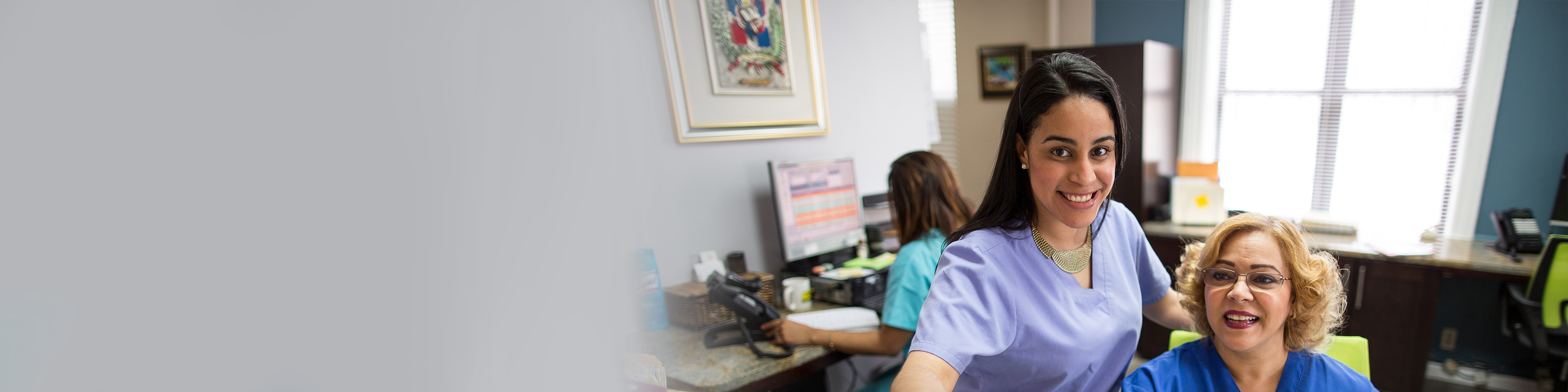 front desk staff smiling